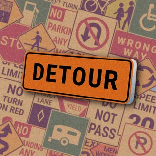 Оранжевый прямоугольный знак с черной надписью "DETOUR". Знак "Detour" указывает на временный маршрут объезда закрытого участка дороги