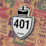 Белый щит в форме короны с черным номером "401". Знак "King's Highway" обозначает номер провинциального шоссе в Онтарио.